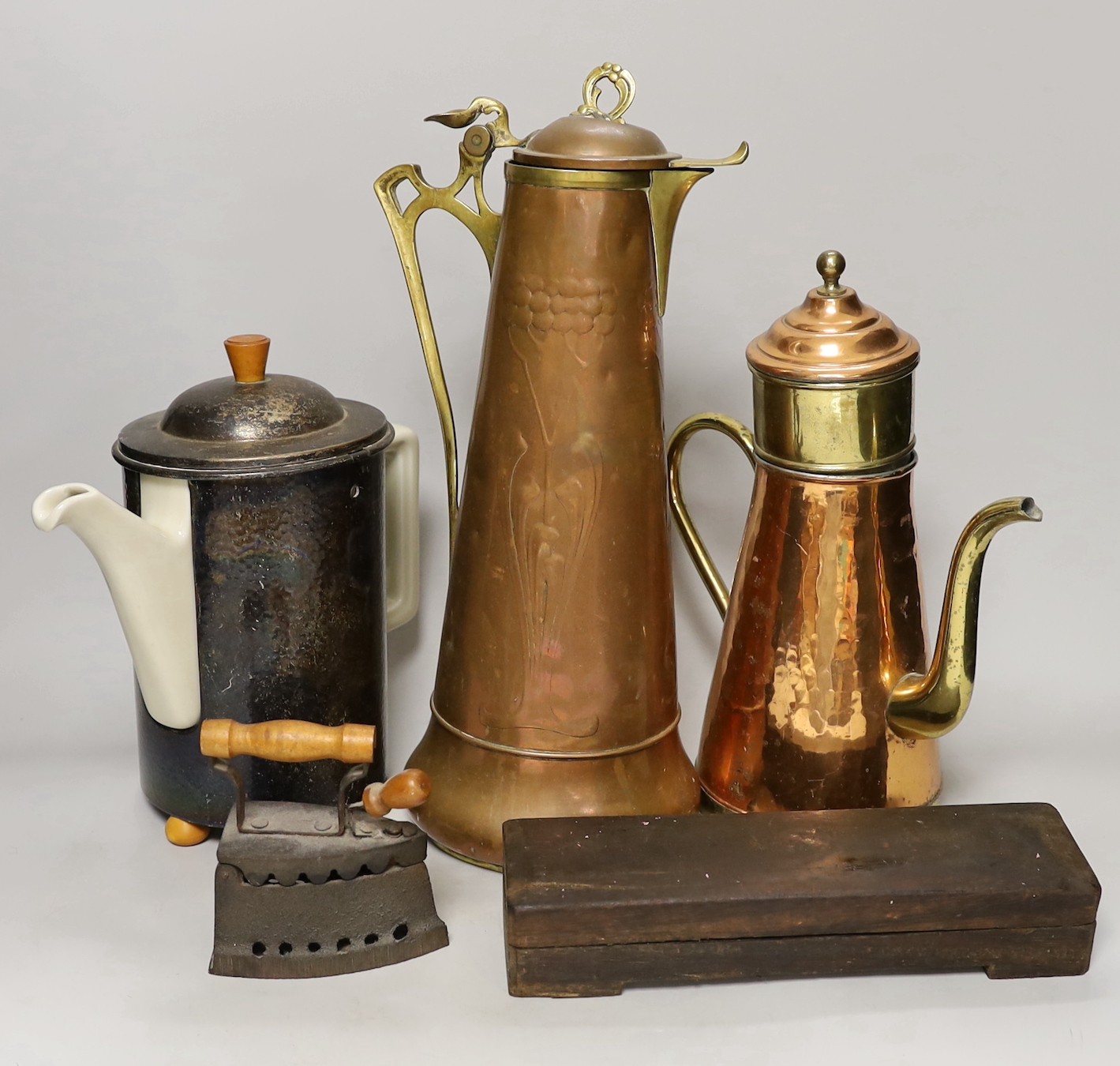 An Art Nouveau copper ewer, a WMF teapot and copper coffee pot, other metalware. Tallest 40cm